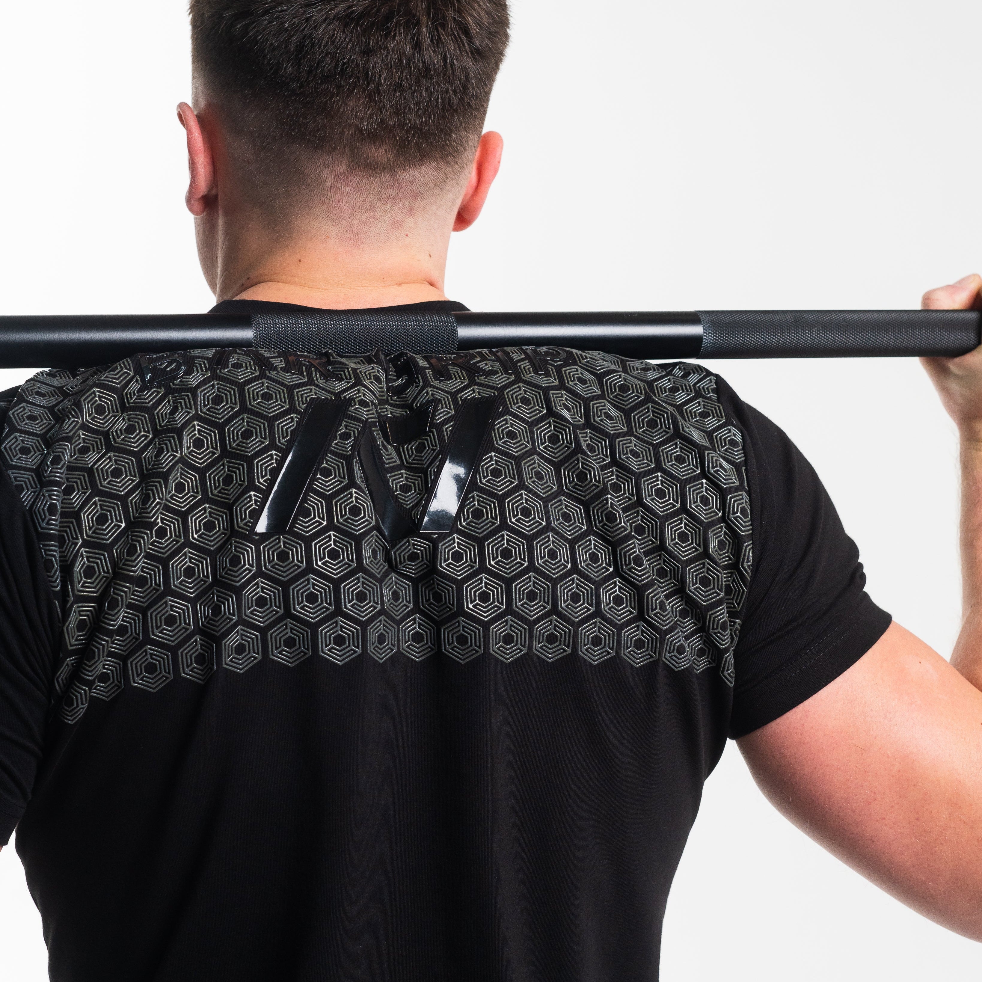 Crest is our classic black on black design. With the Stealth Bar Grip Shirt you can be noticed, yet still, be able to be subtle. The A7 silicone bar grip helps with slippery commercial benches and bars and anchors the barbell to your back. All A7 Powerlifting Equipment shipping to France, Spain, Ireland, Germany, Italy, Sweden and EU.