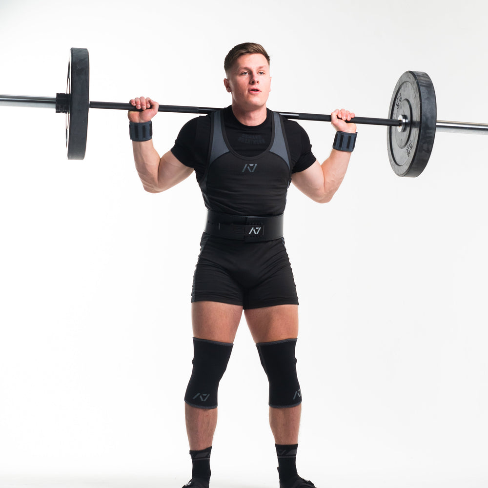 
                      
                        A7 Shadow Stone Crew socks showcase dark grey logos to keep contrast at a minimum and let your energy show on the platform, in your training or while out and about. The IPF Approved Shadow Stone Meet Kit includes Powerlifting Singlet, A7 Meet Shirt, A7 Zebra Wrist Wraps, A7 Deadlift Socks, Hourglass Knee Sleeves (Stiff Knee Sleeves and Rigor Mortis Knee Sleeves). Genouillères powerlifting shipping to France, Spain, Ireland, Germany, Italy, Sweden and EU. 
                      
                    