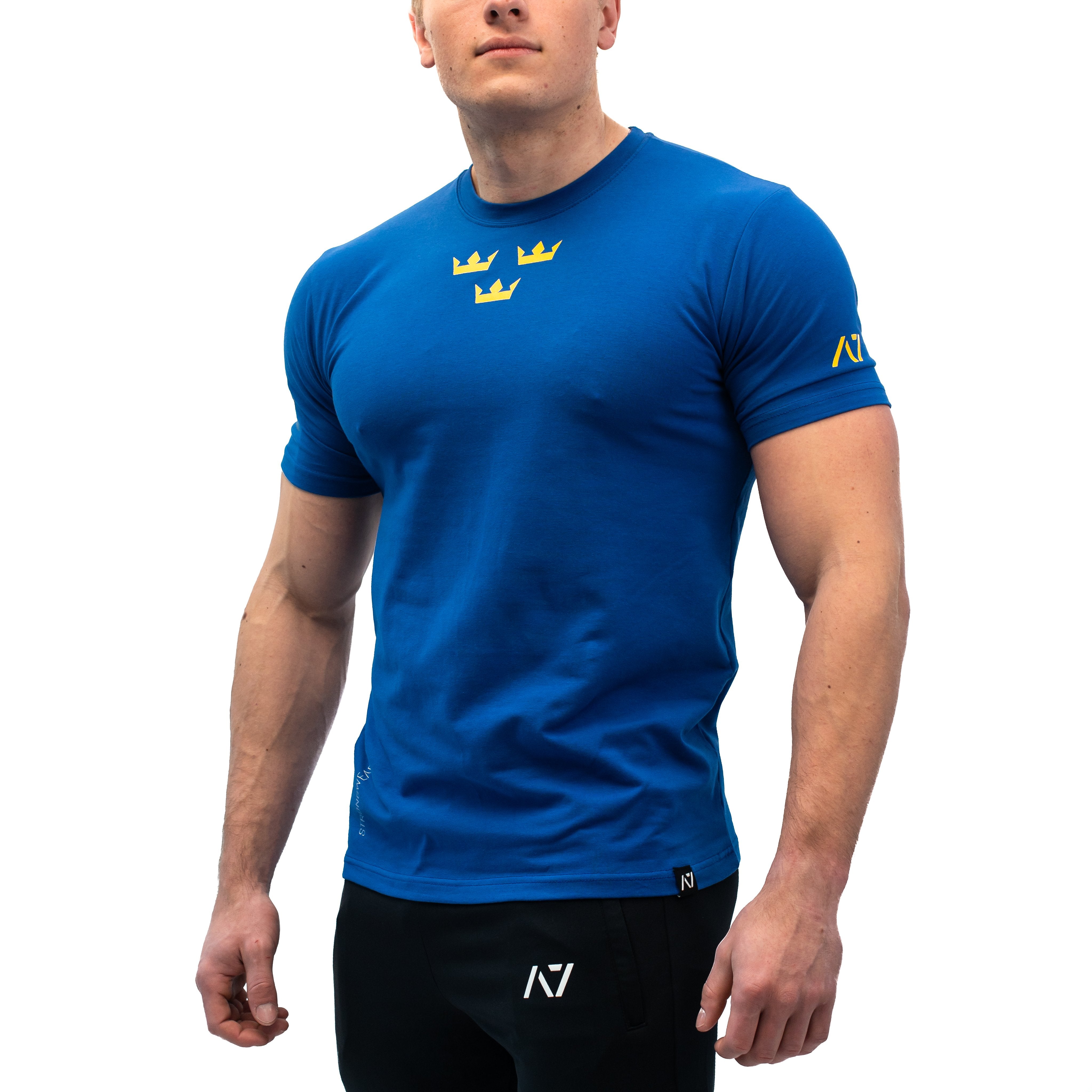 When you step on the platform and want to leave no doubt about your expectations and that you “Demand Greatness” on every lift, the A7 Sweden Meet Shirt lets everyone know you mean business. Now is your chance to celebrate another “country of strength” with this A7 Sweden Meet Tee. The A7 Sweden Meet Shirt is an essential in any IPF approved kit. You can buy this Sweden IPF Approved meet shirt from A7 UK or A7 Europe. 