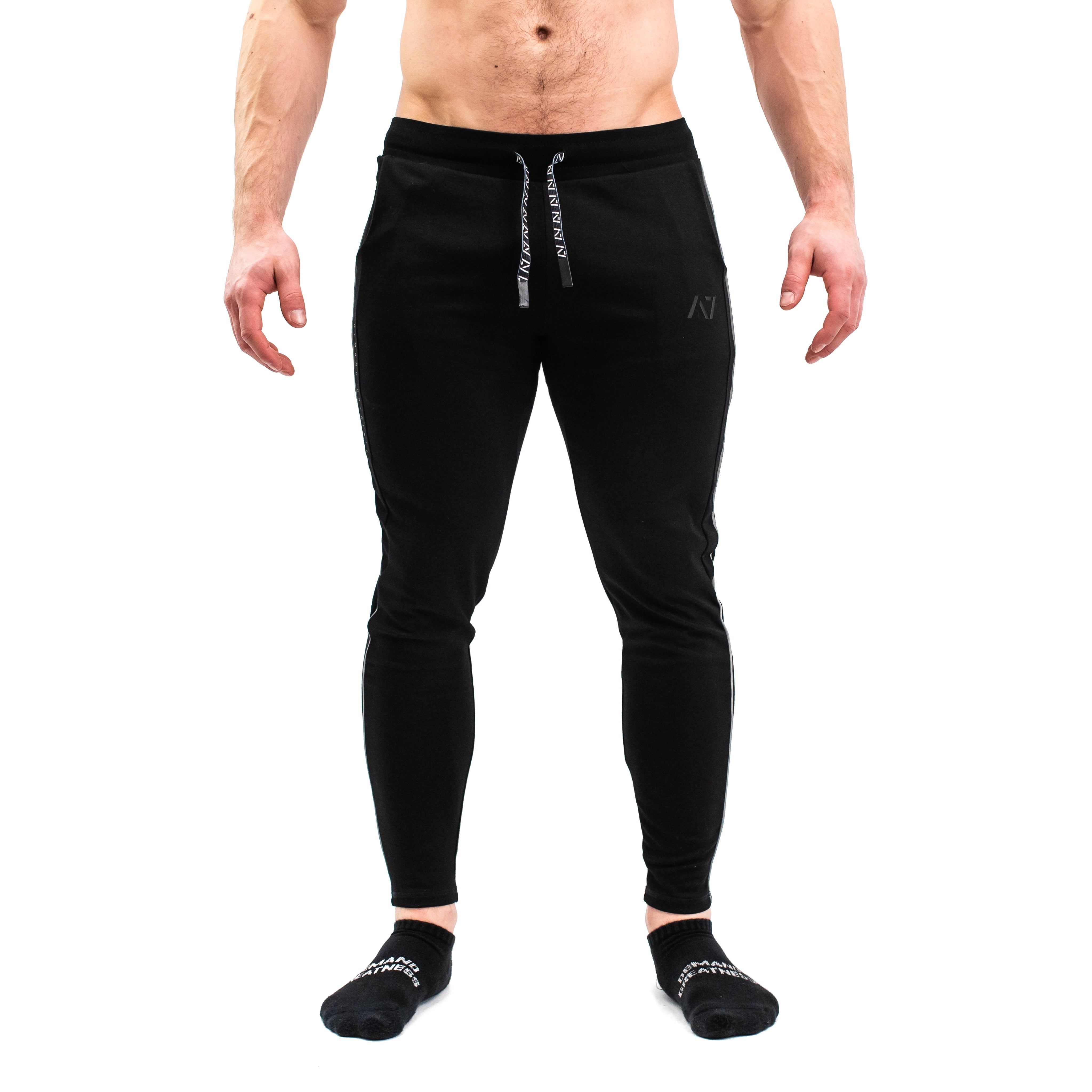Our Moxie Joggers are made with premium cotton spandex fabric to keep you comfy throughout the day whether you are training or going out! Our Moxie Joggers contour to your body and feature a reflective stripe on both side, deep un-zippered pockets and stealth matte logos.