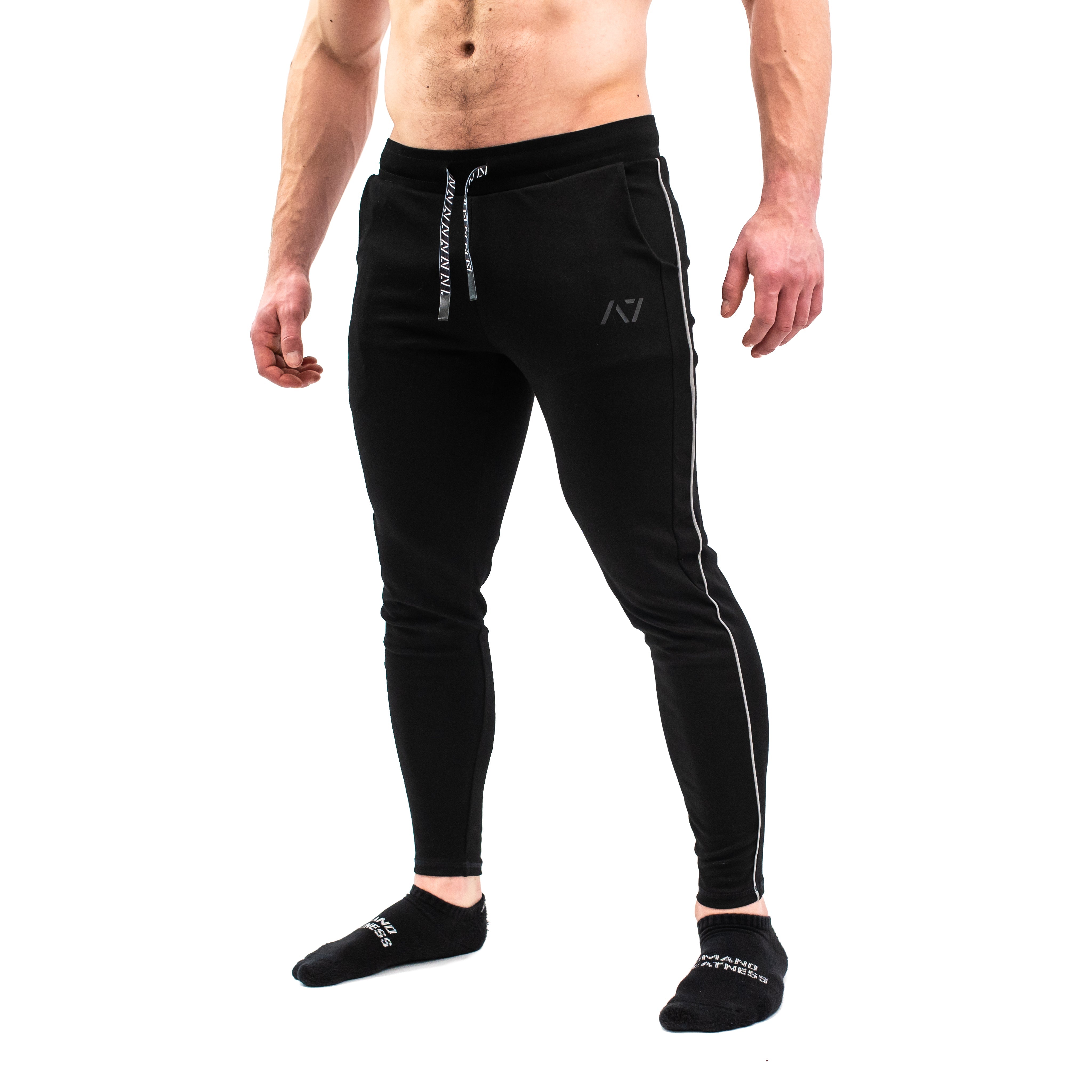 Our Moxie Joggers are made with premium cotton spandex fabric to keep you comfy throughout the day whether you are training or going out! Our Moxie Joggers contour to your body and feature a reflective stripe on both side, deep un-zippered pockets and stealth matte logos.