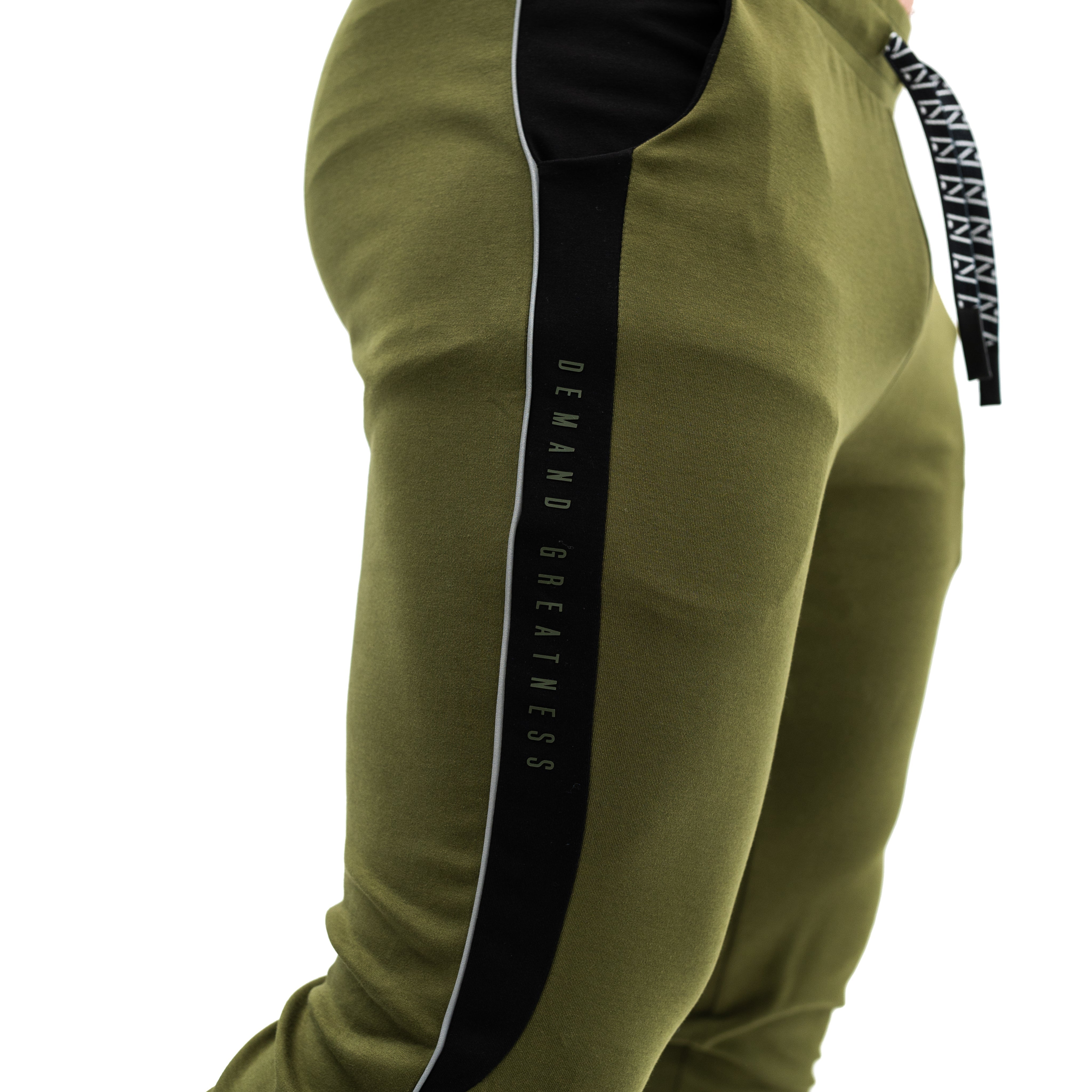 Our Moxie Joggers are made with premium cotton spandex fabric to keep you comfy throughout the day whether you are training or going out! Our Moxie Joggers contour to your body and feature a reflective stripe on both side, deep un-zippered pockets and stealth matte logos. Now in our new military colourway. You can purchase Military Moxie joggers from A7 UK or A7 Europe. A7 UK shipping to UK, Ireland, France, Italy, Germany, the Netherlands, Sweden and Poland.
