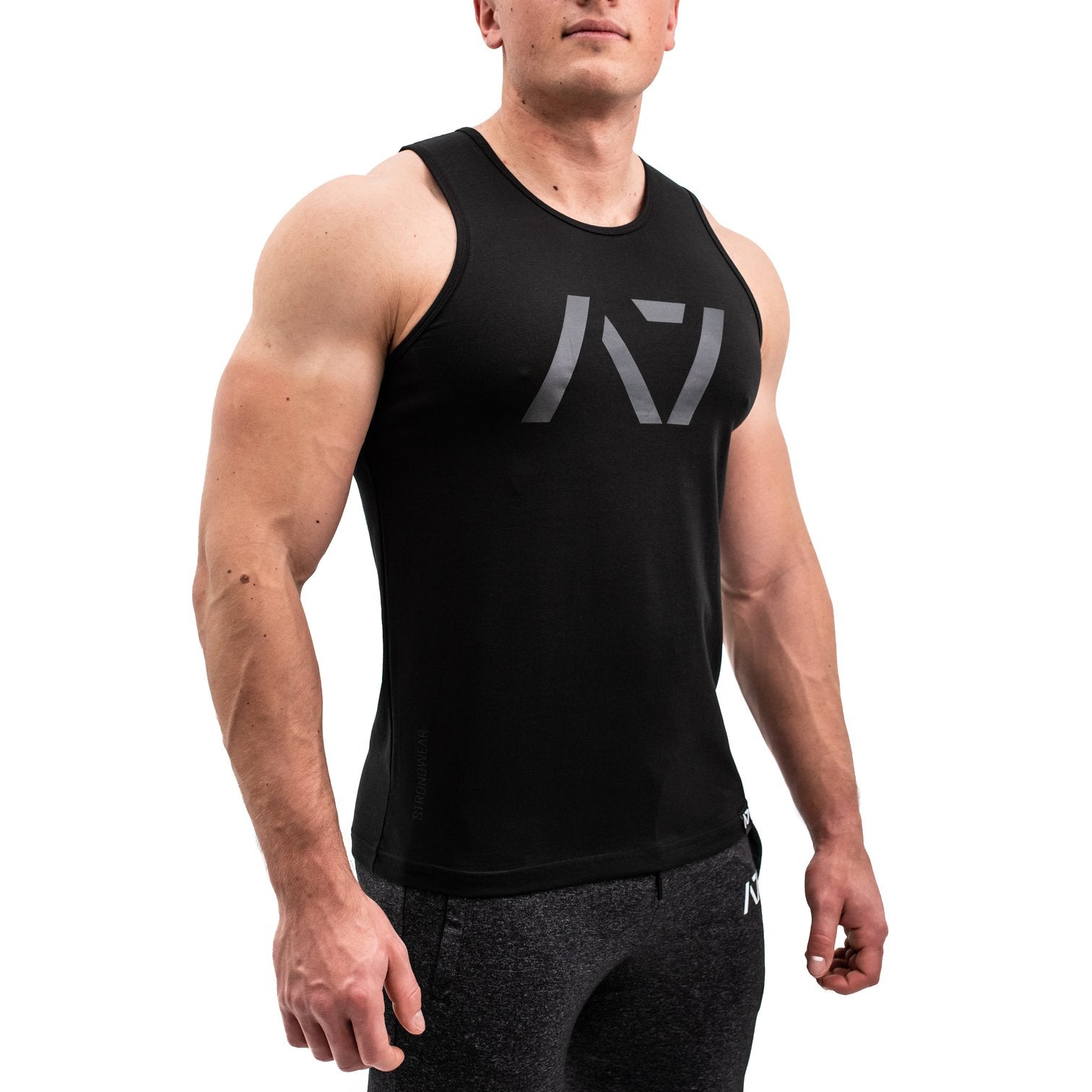 Stealth Bar Grip Tank, great as a squat shirt. Purchase Stealth Bar Grip tank UK from A7 UK. Purchase Stealth Bar Grip Tank Europe from A7 UK. No more chalk and no more sliding. Best Bar Grip Tank Tshirts, shipping to UK and Europe from A7 UK. Stealth is our classic black on black shirt design! The best Powerlifting apparel for all your workouts. Available in UK and Europe including France, Italy, Germany, Sweden and Poland