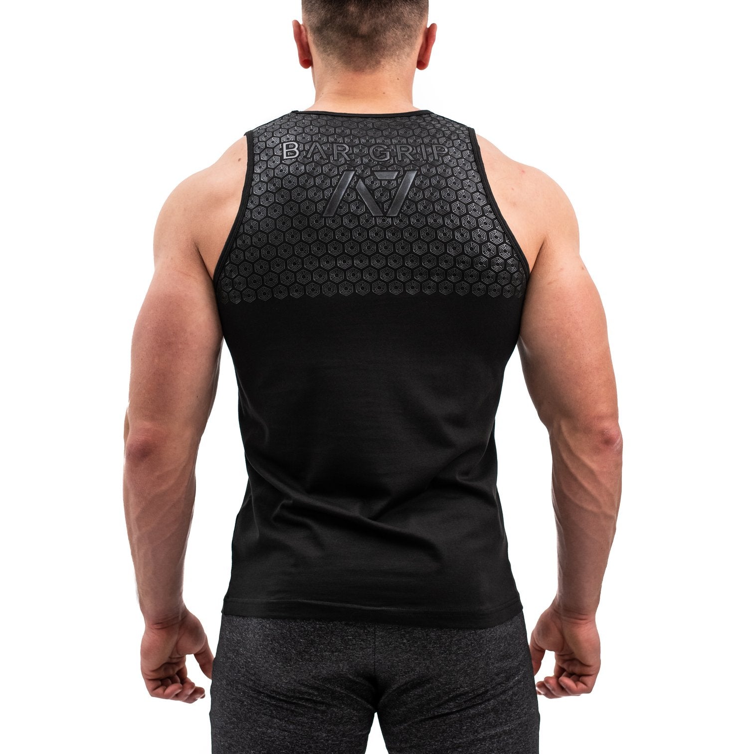 Stealth Bar Grip Tank, great as a squat shirt. Purchase Stealth Bar Grip tank UK from A7 UK. Purchase Stealth Bar Grip Tank Europe from A7 UK. No more chalk and no more sliding. Best Bar Grip Tank Tshirts, shipping to UK and Europe from A7 UK. Stealth is our classic black on black shirt design! The best Powerlifting apparel for all your workouts. Available in UK and Europe including France, Italy, Germany, Sweden and Poland