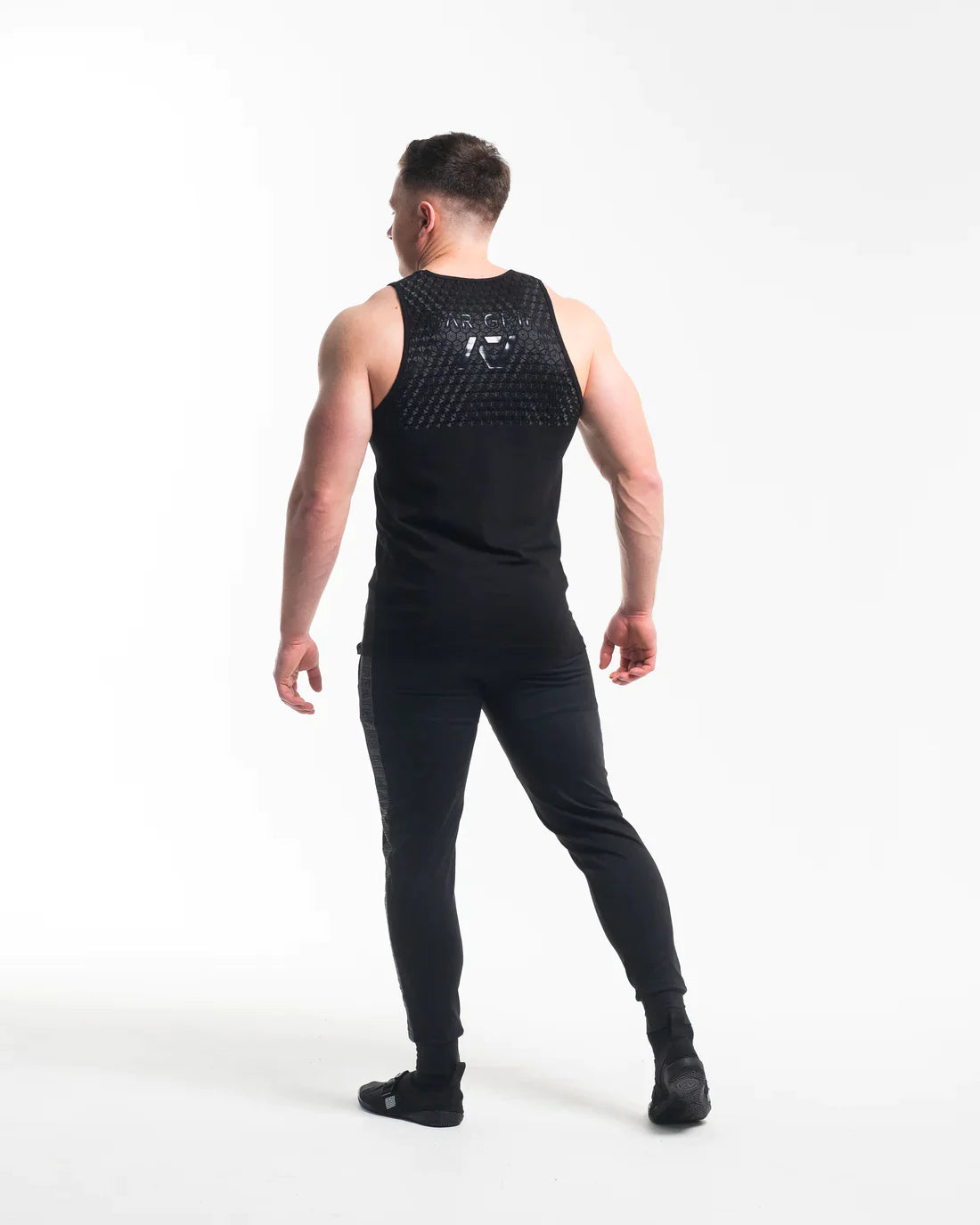 Stealth Bar Grip Tank T-shirt, great as a squat shirt. Purchase Stealth Bar Grip tshirt UK from A7 UK. Purchase Stealth Bar Grip Shirt Europe from A7 UK. No more chalk and no more sliding. Best Bar Grip Tshirts, shipping to UK and Europe from A7 UK. Stealth is our classic black on black shirt design! The best Powerlifting apparel for all your workouts. Available in UK and Europe including France, Italy, Germany, Sweden and Poland