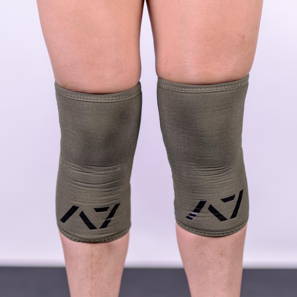A7 IPF approved Military Green CONE knee sleeves are structured with a downward cut panel on the back of the quad and calf to ensure ultimate compression at the knee joint. A7 CONE knee sleeves are IPF approved for use in all powerlifting competitions. A7 cone knee sleeves are made with high quality neoprene and the knee sleeves are sold as a pair. The double seem on the knee sleeves create a greater tension on the knee joint. Available in UK and Europe including France, Italy, Germany, Sweden and Poland 